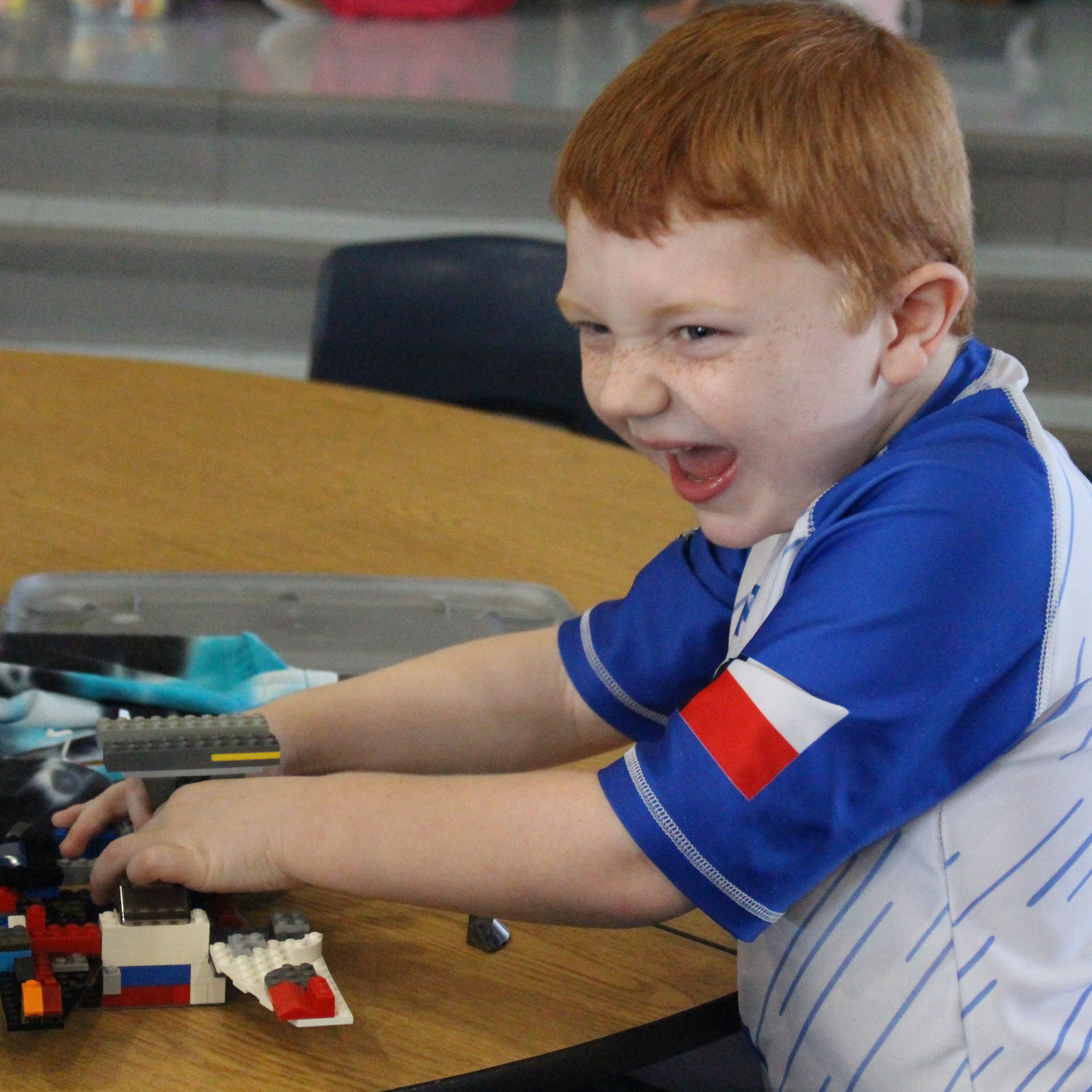 Child playing with legos